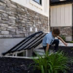 Custom Steel Window Well Cover with EZ Lift System - Mountainland Covers 