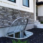Custom Polycarbonate Window Well Cover with EZ Lift System - Mountainland Covers 