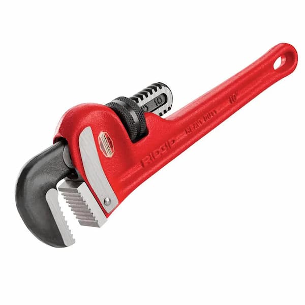 metal pipe and wrenches